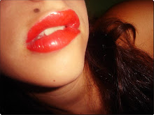 Tus labios de rubi, de rojo carmesí..