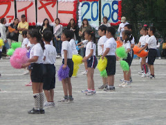 kids and colorful pom poms