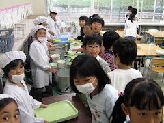 Masked kids serving lunch to