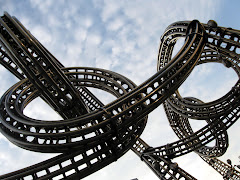 the rollercoaster looking sculpture