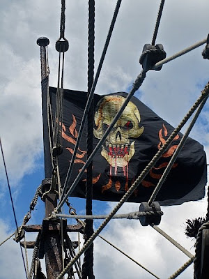 The pirate flag flies high on the Queen Anne's Revenge. - Pirates of the Caribbean On Stranger Tides