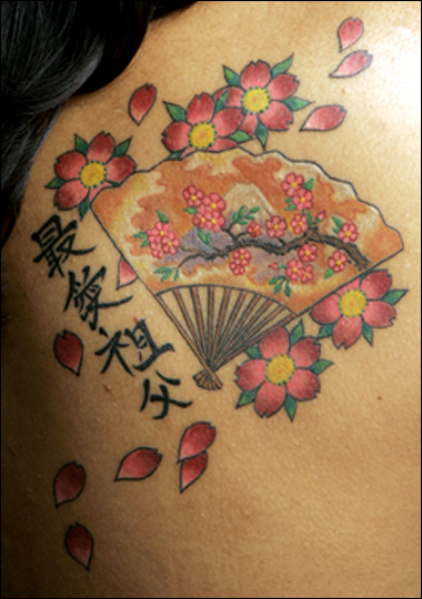 flower tattoos design asian flower tattoo. flower tattoos design