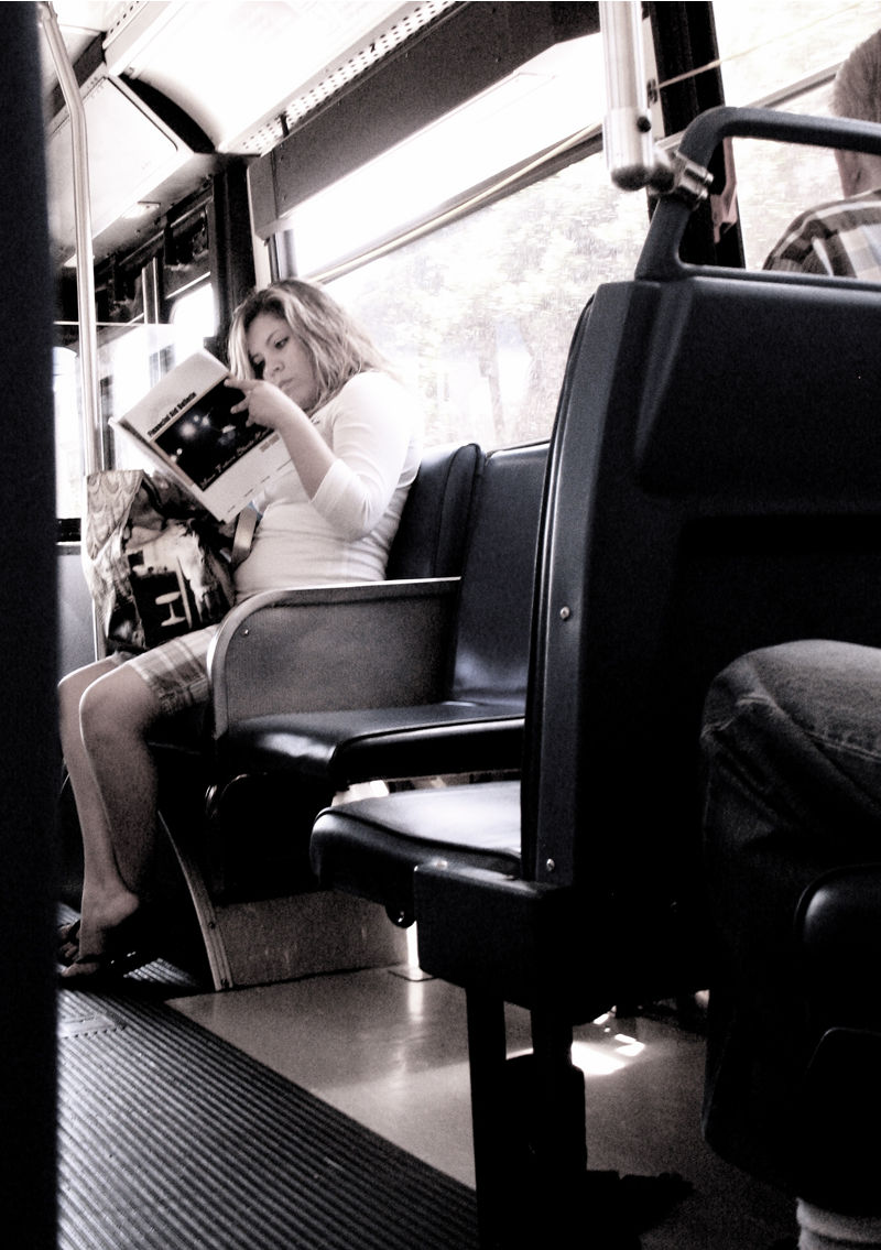 reading on the bus; click for previous post