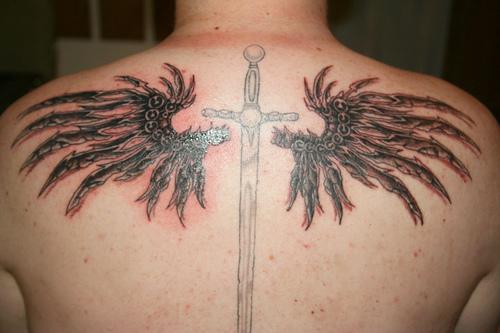 Memorial Cross Tattoo With Angel Wings On Back