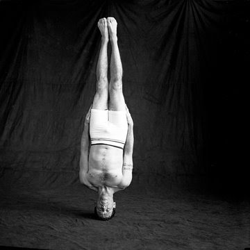 Unsupported headstand and its