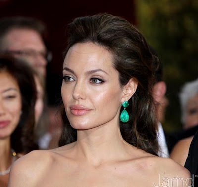 Angelina Jolie in Elie Saab.. Homegirl had on a 65-carat emerald ring & get Angelina Jolie in Elie Saab.. Homegirl had on a 65-carat emerald ring & get