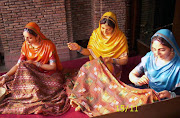 Punjabi girl with Punjabi dress. Punjabi women doing embroidery