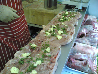 Boned stuffed chickens, ready to roll. Boned chickens