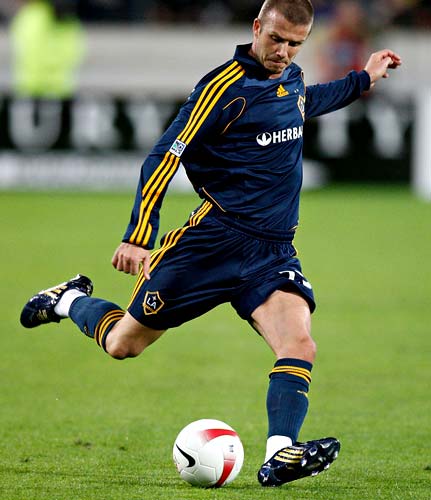 pictures of david beckham playing soccer. Soccer legs are always good :)