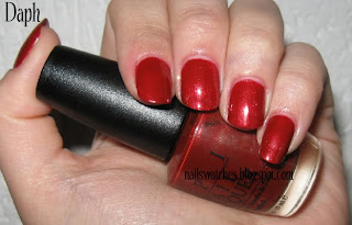 OPI Vould You Like A Lick-tenstein? opi vould you like a lick-tenstein red nail polish shimmer gold nailswatches