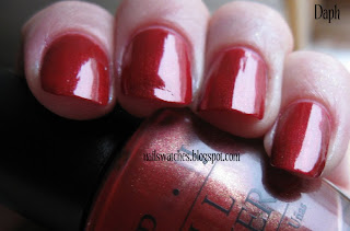 OPI Vould You Like A Lick-tenstein? opi vould you like a lick-tenstein red nail polish shimmer gold nailswatches