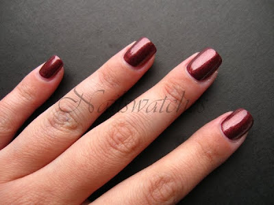 Orly Rockin' Rocket orly rocking rocket holiday collection 2010 tis the season brown red golden shimmer nail polish nailswatches