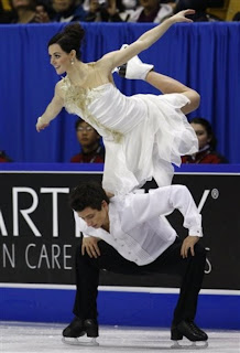 Tessa and Scott perform a tricky balance lift during their free skate at Skate Canada. Photo courtesy daylife.com