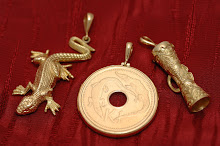 PNG MOTIFS in Gold - a Gecko, a Kina coin & a Kundu drum
