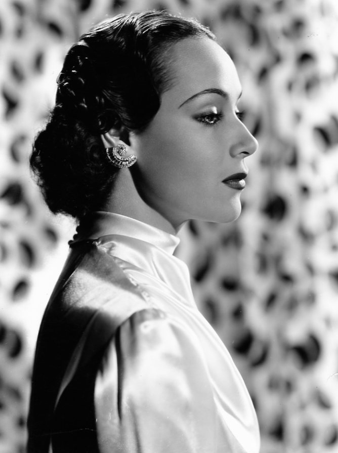 In the photo above Dolores Del Rio models a sequin gown designed by 