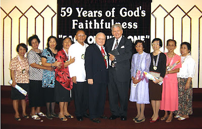 Ptr. Lyons and Dr. Carter with some of BBC Sta. Mesa's charter members