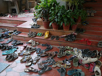 Shoes outside the shala door
