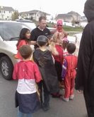 here is mckenzie, jaden and spencer trunk or treating