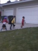 here they are running to the next door for candy