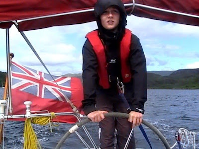 ... the Firth of Clyde from their boat. [Pictured: Morgan Brown at the helm. ... the Firth of Clyde from their boat. [Pictured: Morgan Brown at the helm.