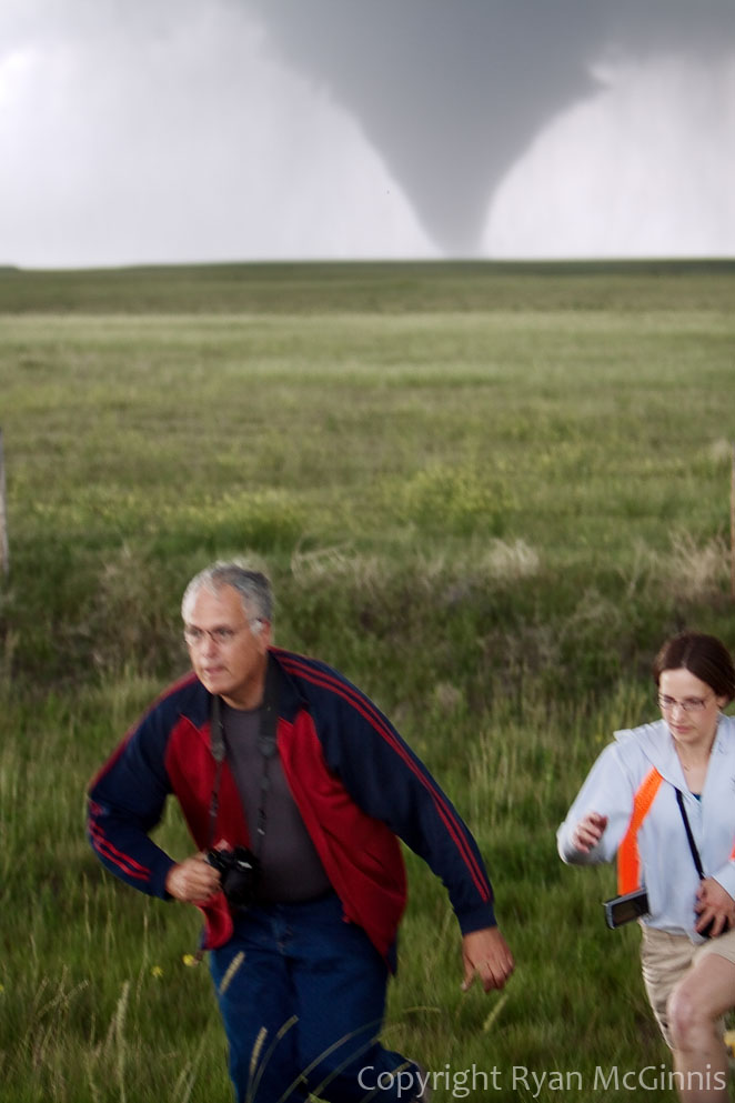 The only photograph in existence of Tim Marshall running away from a tornado