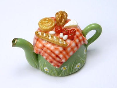 Miniature handmade Picnic 12th scale table teapot with baguette bread tomato brie cheese pork pie tomato in 12th scale made by hand by emmaflam and miniman paris miniatures