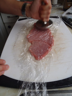 Mike flattening the veal