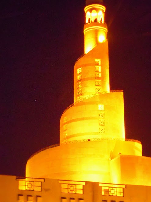 QATAR -  An alighted mosque facing the Persian Gulf in Qatar's capital city, Doha. / @JDumas