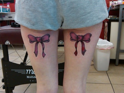 pink tattoos. pink bow tattoos. pink bow
