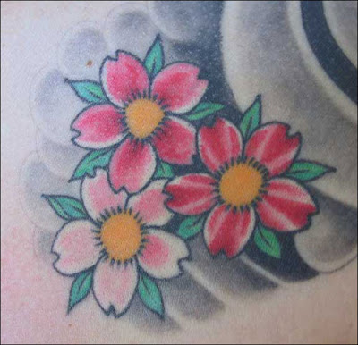 of the Latin phrase Carpe Diem. Cherry Blossoms Tattoo Designs of the Latin phrase Carpe Diem. Cherry Blossoms Tattoo Designs
