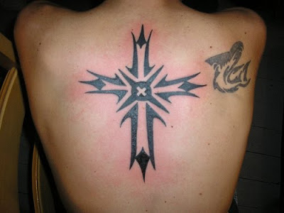 Christian Cross tribal back tattoo. Posted by STUDIOS TATTOO at 6:47 AM