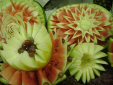 escultura em frutas