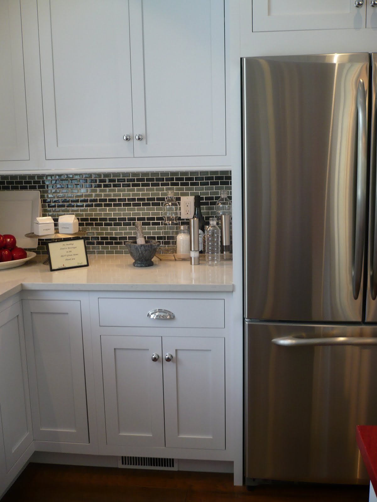 Hgtv kitchen backsplash To the right of the fridge there is a closet pantry with an etched