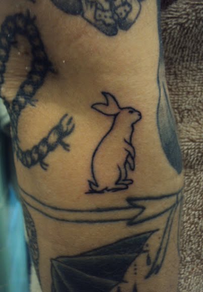 shawn hebrank minnesota tattoo artist End of the Road rabbit tattoos
