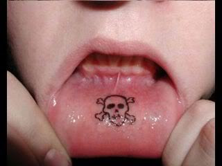 http://4.bp.blogspot.com/_tkKiEGux7r8/S0HxAuJqyII/AAAAAAAAASI/1o4AcveTLqQ/s400/lip_tattoos_5.jpg