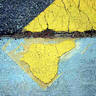 A yellow crosswalk line (c) David Ocker A yellow crosswalk line (c) David Ocker