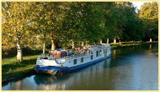 Cruise the canal du midi in the south of France aboard the French hotel barge Clair de Lune - Contact ParadiseConnections.com for more details Cruise the canal du midi in the south of France aboard the French hotel barge Clair de Lune - Contact ParadiseConnections.com for more details