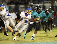 Carl Redd in pursuit of the Wildcat