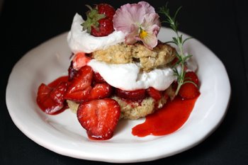rosemary orange shortcake with strawberries in syrup and vegan whipped cream
