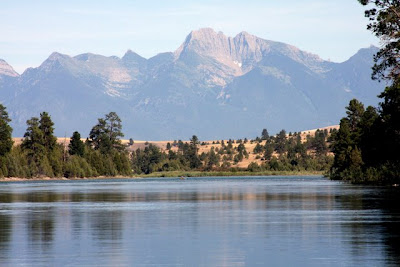 Mount Calowahcan (to the left of the snow) of the Mission Mountains taken from a bit north of Sloan's Bridge