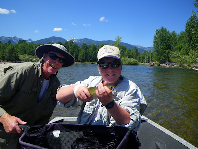 Jeff and Alex Rogers on the Bitterroot River with Alex's trout