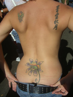 Lower Back Flower Tattoo. Random Tattoo Quote: "Stewed, 
