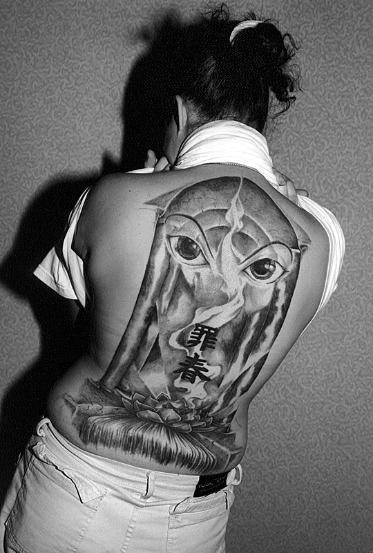 women back tattoo