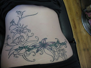 Tattooed Women Flower Tattoo Design