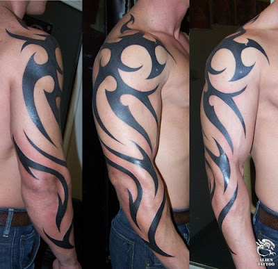 terminator arm tattoo shoulder cross tattoo tipping tattoo artist