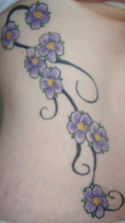 Cherry blossom tattoos can be a striking and beautiful addition to anyone's