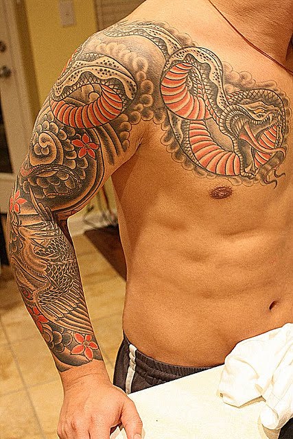 Japanese snake tattoos are really favorite and most wanted by men tattoo 