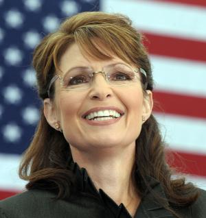 [Sarah+Palin+Big+Smile+With+Flag+Background..jpg]