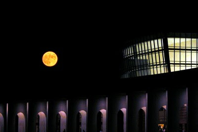 Full moon over Ferguson Center at Christopher Newport University