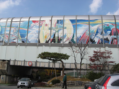 Mural on side of Hapjeong Station subway tube